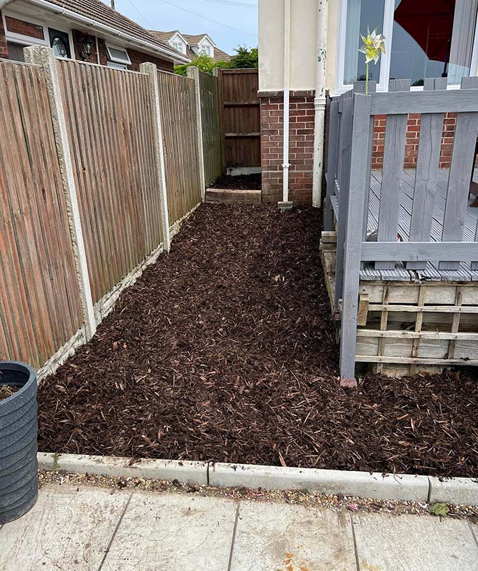 Wood chippings in patio area